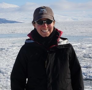 Former Harris Center intern Katie Koster, sporting her Harris Center hat in Antarctica
