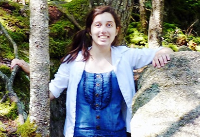 Arianna Zrzavy enjoys the New England woods.