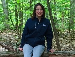 Dorothy Arroyo enjoys the New England woods.