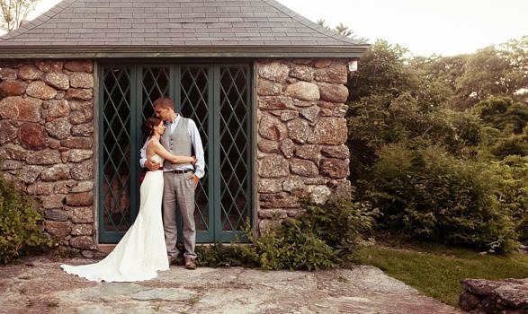 A bridge and groom steal a moment at the poolhouse.  (photo © Martha Duffy / Boro Photography)
