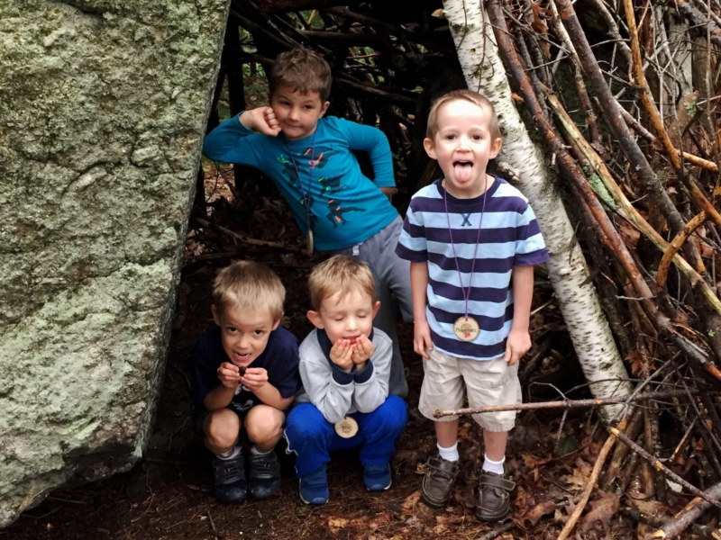 Children play in a fort they built in the Harris Center woods. (photo © Jaime Hutchinson)