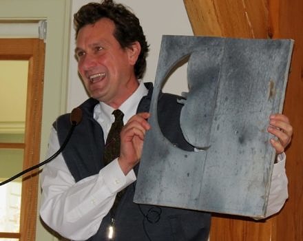 Executive Director Jeremy Wilson announces a very special gift -- a piece of the last outhouse to be removed from our newly-conserved land on Silver Lake -- for volunteer corporate counsel Stephen Froling, in gratitude for his tireless work negotiating complex land protection agreements around Silver Lake..