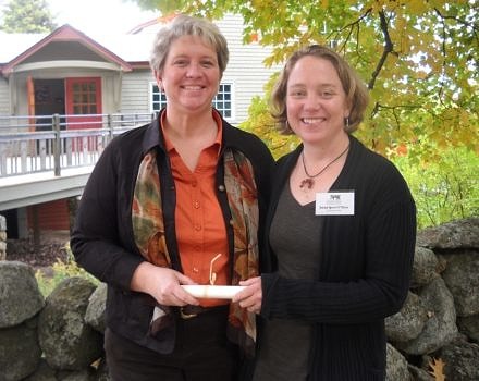 Harris Center naturalist Jenna Spear (right) presented Sharyn D’Eon with the Harris Center's 