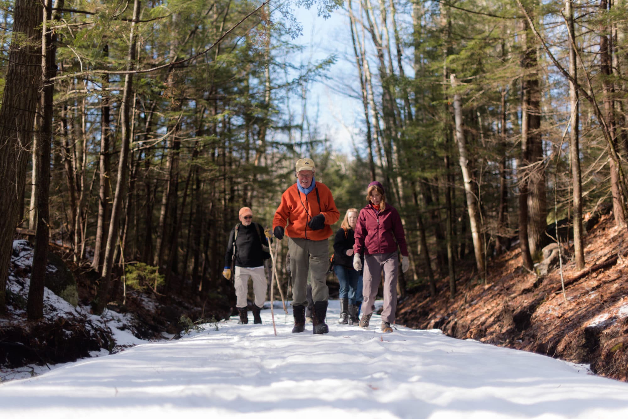 Meade Cadot leads a winter hike on the Harris Center's Jaquith Rail Trail. (photo © Ben Conant)