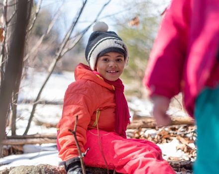 A camper smiles during the Harris Center's winter vacation camp. (photo © Ben Conant)