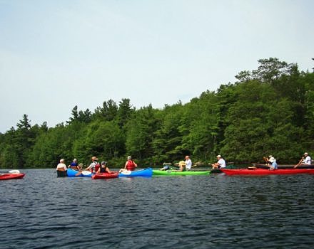 A flotilla of kayaks on a Harris Center outing. (photo © Ken Paulsen)