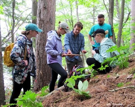 Harris Center Executive Director Jeremy Wilson trains the KSC internship team on how to sample and preserve tree cores for a dendrochronology study of Norway Pond. (photo © Brett Amy Thelen)