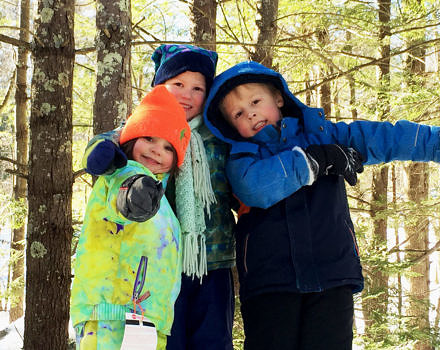 A trio of happy campers at the Harris Center's Winter Adventures Camp. (photo © Jaime Hutchinson)