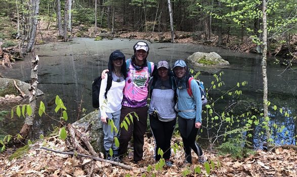 The 2019 KSC conservation interns pause in front of a newly-documented vernal pool during the first full week of their internship. (photo © Karen Seaver)