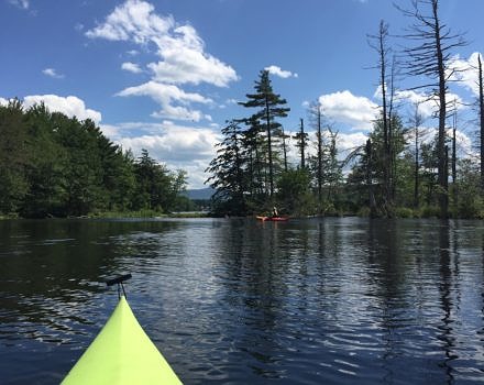 Kayakers paddle at the outlet of the Great Meadow in Harrisville. (photo © Nelson Trails Group)