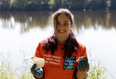 A volunteer participates in the Source to Sea Cleanup. (photo © Connecticut River Conservancy)