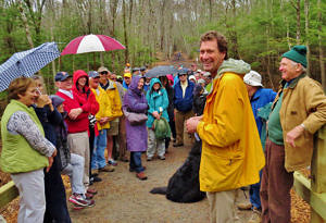 A photo of Jeremy Wilson at a ribbon-cutting ceremony for a new trail.