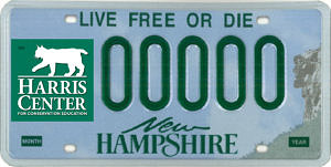 A photo of a sample license plate with a Harris Center decal.