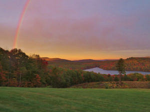An autumn view of sunset over Spoonwood Pond -- complete with rainbow -- as seen from Greengate. (photo © Meade Cadot)