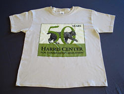 A photo of the front of the Harris Center 50th Anniversary commemorative kids' tee.