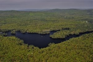 An aerial view of Robb Reservoir and surrounding lands in spring.