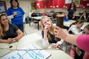 The LAB GIRLS afterschool club learns about forestry with UNH Extension Forester Karen Bennett. (photo © Ben Conant)