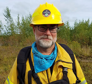 Eric Aldrich at a controlled burn conducted by The Nature Conservancy. (photo © Ian Aldrich)