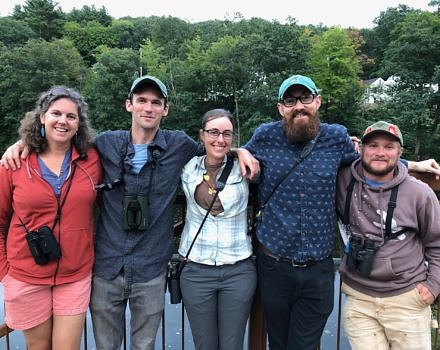 Five former Pack Monadnock raptor biologists (from left to right: Julie Brown, Henry Walters, Katrina Fenton, Chad Witko, and Levi Burford) gather for hawk watching and camaraderie in 2019. (photo © Phil Brown)