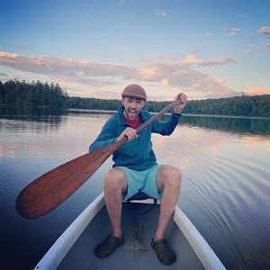 Miles Stahmann paddles on Willard Pond.