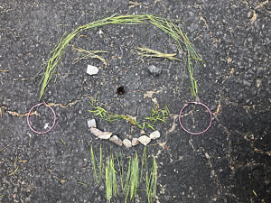 A face made from natural materials. 