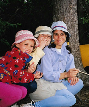 Molly, Maya, and Roshan roast marshmallows in 2005.