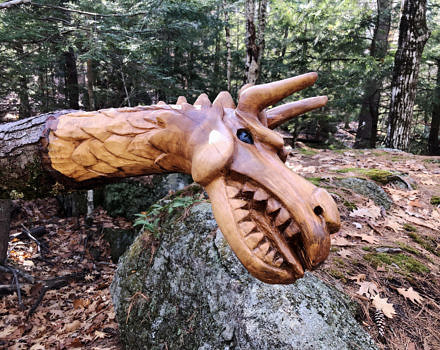 A carved wooden dragon along the Harriskat Trail. (photo © Brett Amy Thelen)