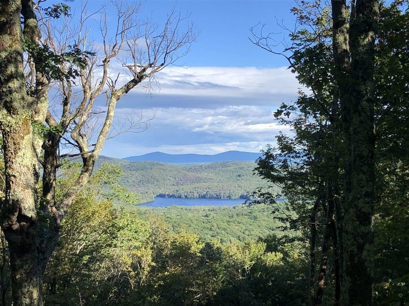 A view of Lake Nubanusit from Blacktop, in the Partridge Woods trail network. (photo © Brett Amy Thelen)