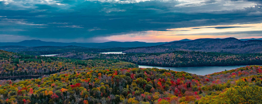 A panoramic view of an expanse of autumn woods, seen from the East Pinnacle viewpoint on the Kulish Ledges Trail. (photo © Will Kindler)