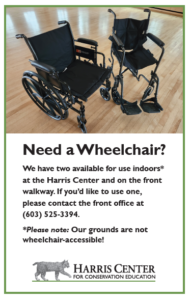 A sign that says, "Need a wheelchair? We have two available for use indoors at the Harris Center."