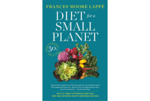 Diet for a Small Planet book cover: turquoise with vegetables.