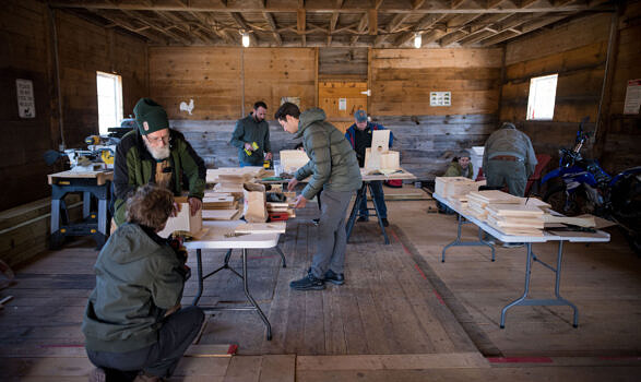 Volunteers busy at work constructing kestrel boxes! (photo © Ben Conant)