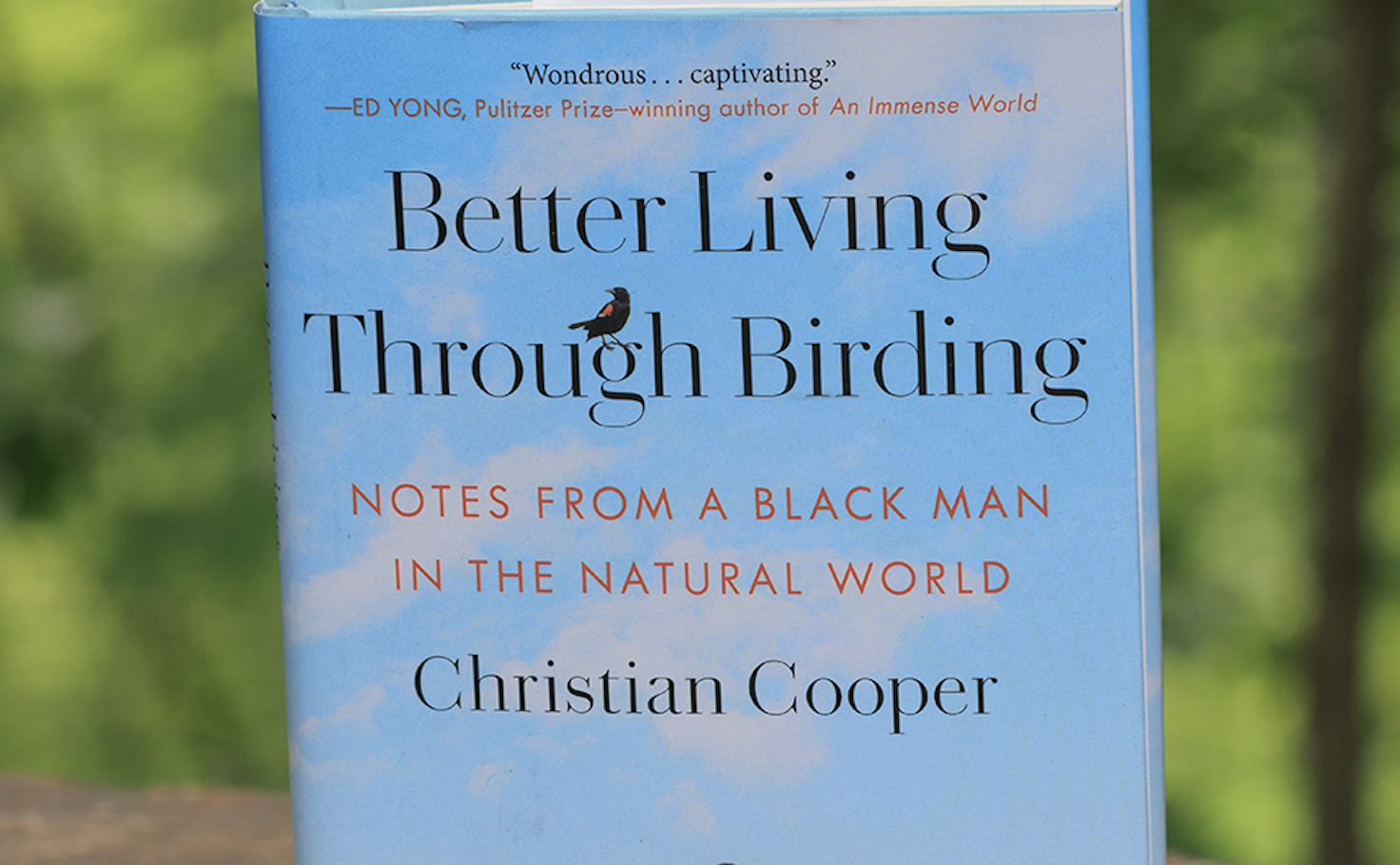 Better Living Through Birding book against a natural background. (photo © Conservancy for Cuyahoga National Park)