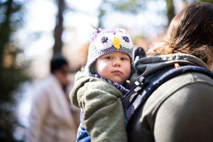 A baby in a backpack. (photo © Ben Conant)