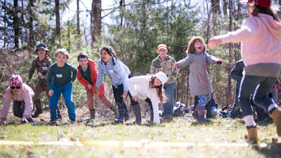 Children playing in the forest (Photo © Ben Conant)