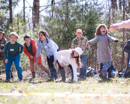 Children playing in the forest (Photo © Ben Conant)