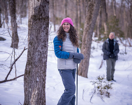 Susie Spikol discusses animal tracking with a group on Beech Hill (photo © Ben Conant)