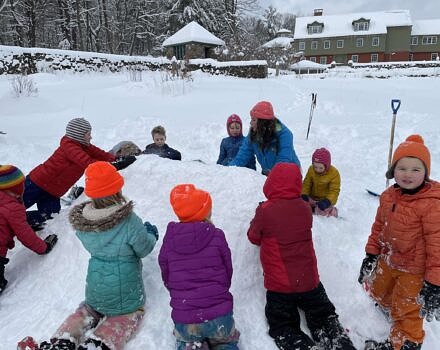 Kids and Susie Spikol in the snow at the Harris Center (photo © Audrey Dunn)