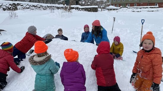 Kids and Susie Spikol in the snow at the Harris Center (photo © Audrey Dunn)